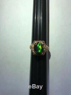 3.85 ct Natural black opal, 10 k rose gold unisex art deco style ring. See Video