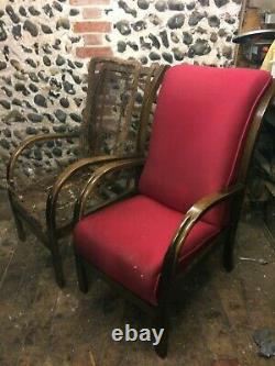 A pair of Vintage Halabala Art Deco style Bentwood arm chairs
