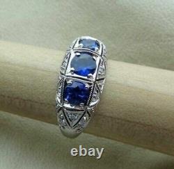 Art Deco Style Simulated Blue Sapphire Three-Stone Engagement Ring In 925 Silver