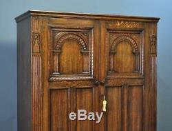Attractive Large Vintage Tudor Style Carved Panelled Oak Double Door Wardrobe