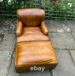 Beautiful vintage art deco leather arm chair with footstool. Howard & Son style