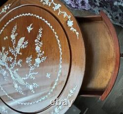 Circle Table With A Bird Patterns