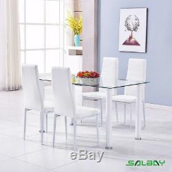 Clear tempered glass dining table and 4 high back Faux Leather Chairs seats