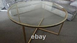 Round glass top coffee table