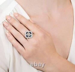 Bague de fiançailles en argent 925 avec motif de fleur stylisée en style Art déco et pierre de diamant simulée.