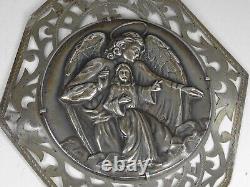 Collier pendentif 'Que Dieu vous bénisse' en argent sterling, signé dans le style Art déco.