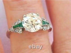 Style Art Déco Bague en argent sertie d'un diamant de synthèse rond de 3,0 ct et d'une émeraude verte