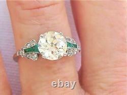 Style Art Déco Bague en argent sertie d'un diamant de synthèse rond de 3,0 ct et d'une émeraude verte
