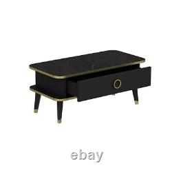 Table basse design en marbre noir et or