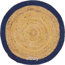 Tapis rond en jute 100% naturel avec ligne bleue tressée, aspect rustique réversible.